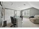 A spacious bonus room with a comfortable lounge chair and bright natural light at 2028 Ruddy Rd, Raleigh, NC 27616