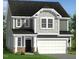 Craftsman-style home with a mix of horizontal and shingle siding, complemented by stone accents at 203 Steel Spring Rd # 21, Angier, NC 27501