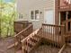 Exterior shot of a two-story back deck, showing access from the ground and upper levels at 205 Glenview Pl, Chapel Hill, NC 27514