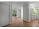 Hallway shot leading to basement spaces, exercise room and laundry area at 205 Glenview Pl, Chapel Hill, NC 27514