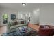 Open-concept living room with seamless flow to the kitchen, ideal for entertaining and everyday living at 205 Glenview Pl, Chapel Hill, NC 27514