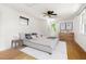 Comfortable bedroom featuring a ceiling fan and neutral decor at 209 N Occoneechee St, Hillsborough, NC 27278