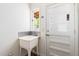 Functional laundry room with utility sink and access to the exterior at 209 N Occoneechee St, Hillsborough, NC 27278
