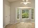 Breakfast nook featuring a door and bay window at 210 Needle Park Dr, Cary, NC 27513