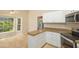 Kitchen featuring granite countertops and stainless steel appliances at 210 Needle Park Dr, Cary, NC 27513