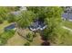 Aerial view of a home featuring a fenced backyard and storage shed at 2102 Courtland Dr, Sanford, NC 27330
