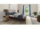 Cozy bedroom featuring a bed with modern decor and great natural light at 2102 Courtland Dr, Sanford, NC 27330