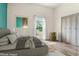 Bright bedroom featuring a comfortable bed, ample natural light, and a spacious closet at 2102 Courtland Dr, Sanford, NC 27330