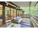 Outdoor deck with modern furniture and panoramic views at 220 Glenhill Ln, Chapel Hill, NC 27514