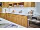 Gourmet kitchen featuring custom cabinetry, modern appliances, and stylish finishes at 220 Glenhill Ln, Chapel Hill, NC 27514