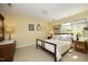 Cozy bedroom with neutral walls, and a bright window at 221 Ironwoods Dr, Chapel Hill, NC 27516