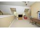 Upstairs bonus room with neutral walls and lots of natural light at 221 Ironwoods Dr, Chapel Hill, NC 27516