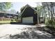 Spacious two-car garage and wide driveway with extra parking at 221 Ironwoods Dr, Chapel Hill, NC 27516