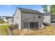 Home showcases a screened back porch, fenced backyard, and modern design at 2215 Montebell View Dr, Fuquay Varina, NC 27526