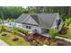Community building with a pool, manicured landscaping, and inviting gathering spaces at 2215 Montebell View Dr, Fuquay Varina, NC 27526
