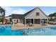 Community pool features lounge area, covered seating, and playground at 2215 Montebell View Dr, Fuquay Varina, NC 27526
