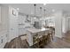 Bright, eat-in kitchen with stainless appliances, center island and hardwood floors at 2215 Montebell View Dr, Fuquay Varina, NC 27526