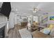 Spacious open-concept layout connecting the living room to a modern kitchen, perfect for entertaining at 2215 Montebell View Dr, Fuquay Varina, NC 27526
