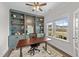Bright and inviting office space with built-in shelves and a large window offering plenty of natural light at 2215 Montebell View Dr, Fuquay Varina, NC 27526