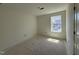 Bright bedroom with a window, providing a comfortable space filled with natural light and a peaceful atmosphere at 2410 Abbot Hall Dr, Raleigh, NC 27616