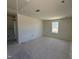 Cozy bedroom featuring a window offering natural light, creating a comfortable and inviting space at 2410 Abbot Hall Dr, Raleigh, NC 27616