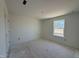 Comfortable bedroom with a bright window, providing natural light and a relaxing ambiance at 2410 Abbot Hall Dr, Raleigh, NC 27616