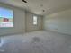 Large bonus room with multiple windows, offering plenty of natural light and flexible space for various uses at 2410 Abbot Hall Dr, Raleigh, NC 27616