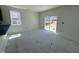 Bright dining area with sliding glass doors leading to the outdoors, adjacent to the kitchen at 2410 Abbot Hall Dr, Raleigh, NC 27616