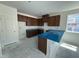 Modern kitchen features granite countertops, custom cabinets, and a central island, ready for personalization at 2410 Abbot Hall Dr, Raleigh, NC 27616