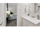 Bathroom with vanity and view into bedroom at 2611 Sawmill Rd, Raleigh, NC 27613