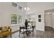 Bright dining area with vaulted ceilings, natural light, and easy access to the kitchen at 2611 Sawmill Rd, Raleigh, NC 27613