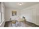 Inviting home office with natural light, neutral tones, and ample closet space at 2611 Sawmill Rd, Raleigh, NC 27613