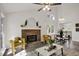 Vaulted ceilings, fireplace, and modern finishes combine to create an inviting living space at 2611 Sawmill Rd, Raleigh, NC 27613