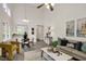 Open-concept living space with vaulted ceilings, vinyl flooring, and stylish furnishings at 2611 Sawmill Rd, Raleigh, NC 27613