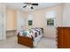 Bright bedroom offering natural light through two windows, built in desk, and ample space at 2821 Penfold Ln, Wake Forest, NC 27587