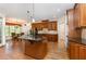 Spacious kitchen with center island, granite countertops, and ample cabinet space at 2821 Penfold Ln, Wake Forest, NC 27587