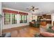 Bright living room offering hardwood floors and an open view of the kitchen at 2821 Penfold Ln, Wake Forest, NC 27587