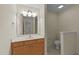 Bathroom featuring neutral paint, vanity with storage and a toilet with bright lighting at 3212 Imperial Oaks Dr, Raleigh, NC 27614