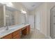 Bathroom features a dual sink vanity, soaking tub, and a clear standing shower at 3212 Imperial Oaks Dr, Raleigh, NC 27614