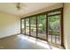 Relaxing screened porch offering a tranquil view of the outdoor landscape at 3212 Imperial Oaks Dr, Raleigh, NC 27614