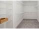 Walk-in closet with wire shelving and gray carpet at 3621 Bailey Lake Dr, Fuquay Varina, NC 27526