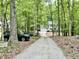 Private drive leads to home with attached garage, offering seclusion and parking convenience at 3648 Sleepy Hollow, Wake Forest, NC 27587