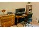 Inviting home office with modern desk setup, computer monitors, and desk chair at 3648 Sleepy Hollow, Wake Forest, NC 27587