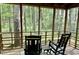 Enjoy nature on this screened in porch with tranquil views, perfect for relaxation and outdoor living at 3648 Sleepy Hollow, Wake Forest, NC 27587