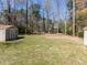 Expansive backyard with mature trees, perfect for outdoor activities and enjoying nature at 3818 Hillgrand Dr, Durham, NC 27705