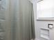 Bathroom featuring a shower, shower curtain and window at 3818 Hillgrand Dr, Durham, NC 27705