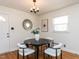 Cozy dining area with a round table, modern chairs, and a stylish chandelier at 3818 Hillgrand Dr, Durham, NC 27705