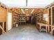 Interior view of the garage with exposed framing, offering ample storage and workspace at 3818 Hillgrand Dr, Durham, NC 27705