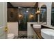 Modern bathroom with glass-enclosed shower and dual sinks, providing a luxurious and functional space at 408 E Maynard Ave, Durham, NC 27704