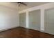 Spacious bedroom with gorgeous hardwood floors, great natural light, and ample closet space at 408 E Maynard Ave, Durham, NC 27704